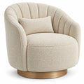 Sillón tapizado de líneas curvas con acolchado acanalado, beige y dorado